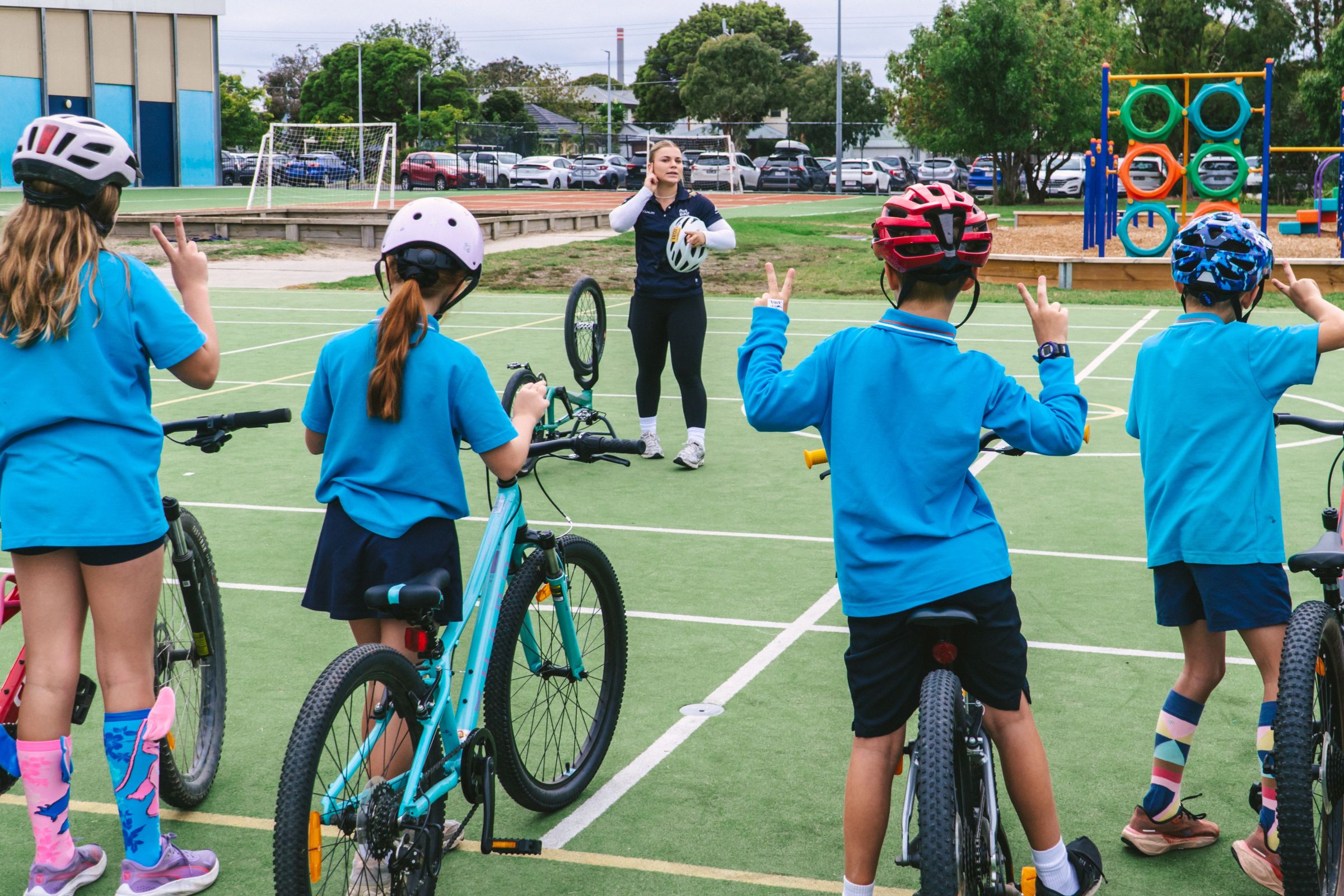 An AusBike instructor leads a skills and safety session at Newport Gardens Primary School in Melbourne during Ride2School Day